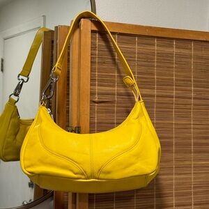 Yellow Wilson’s leather purse